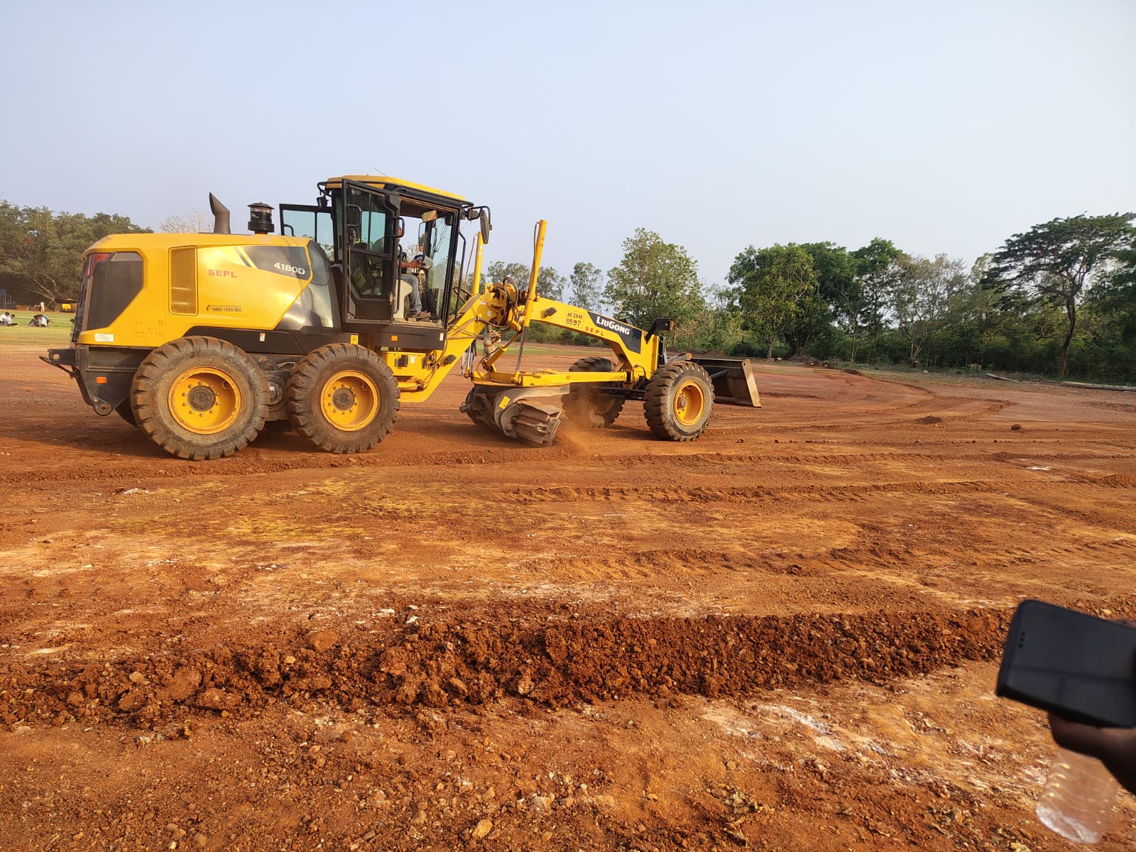 Grader levelling the sub-base